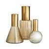 Set de tres floreros humo con dorado