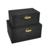 Set de cajas negras con herraje dorado