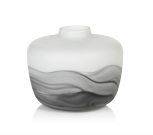 Base de vidrio blanca con diseño gris.